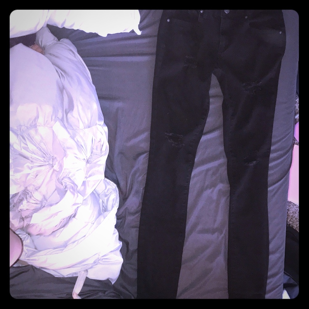 Tilly’s black ripped jeans